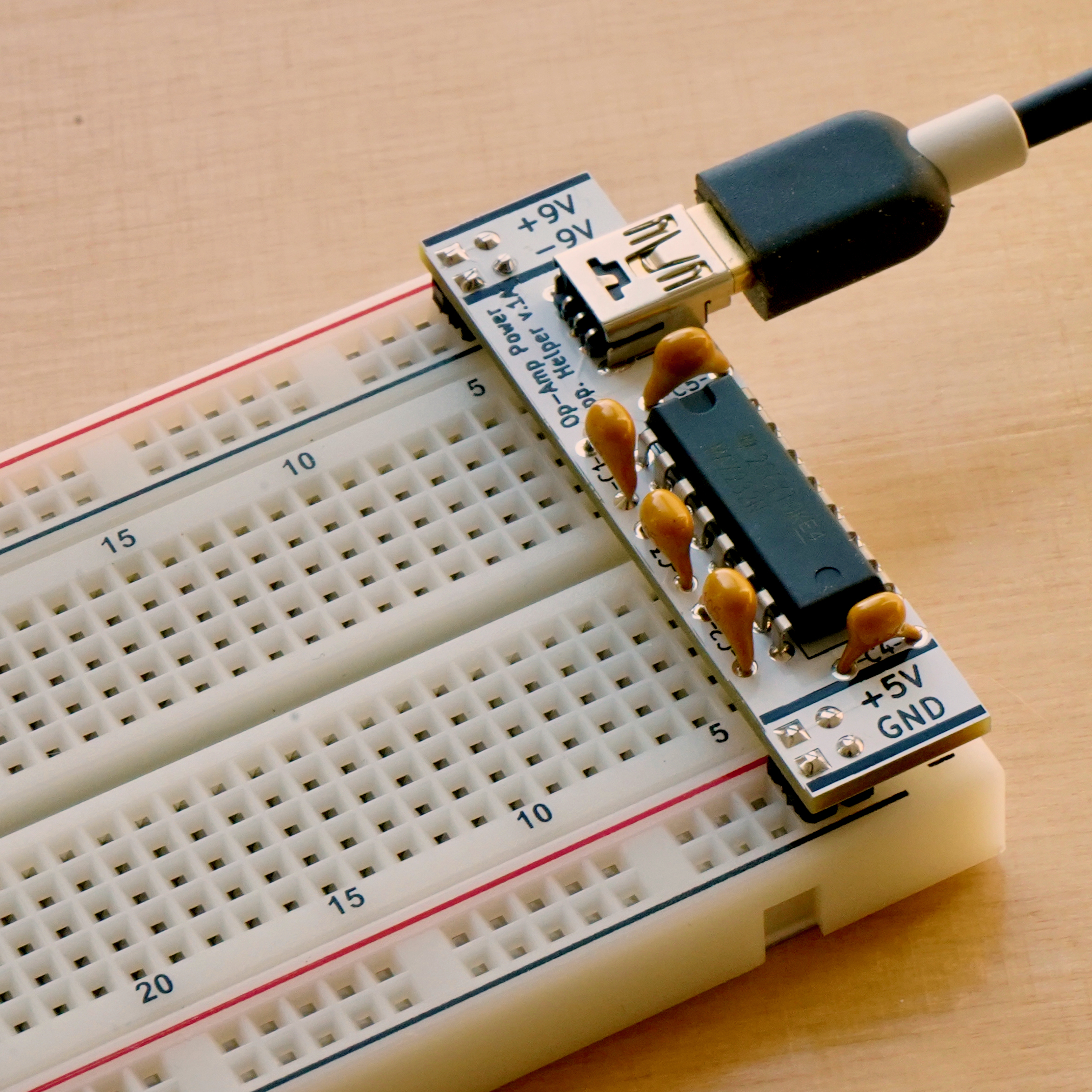 The Op-Amp Helper PCB installed on a breadboard.